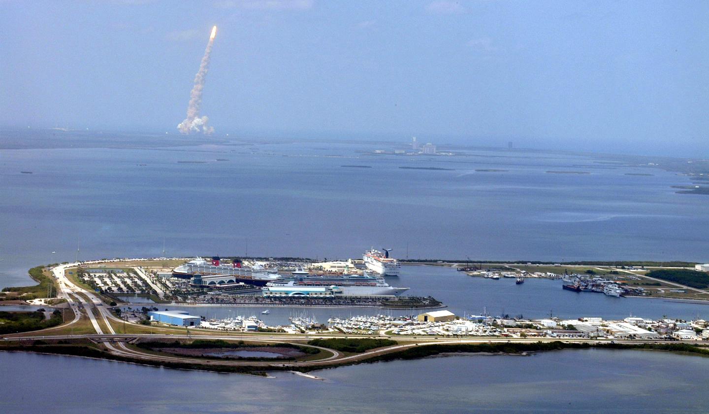 PORT CANAVERAL, FL - A rocket launches into space from Cape Canaveral Air Force Station north of the port.